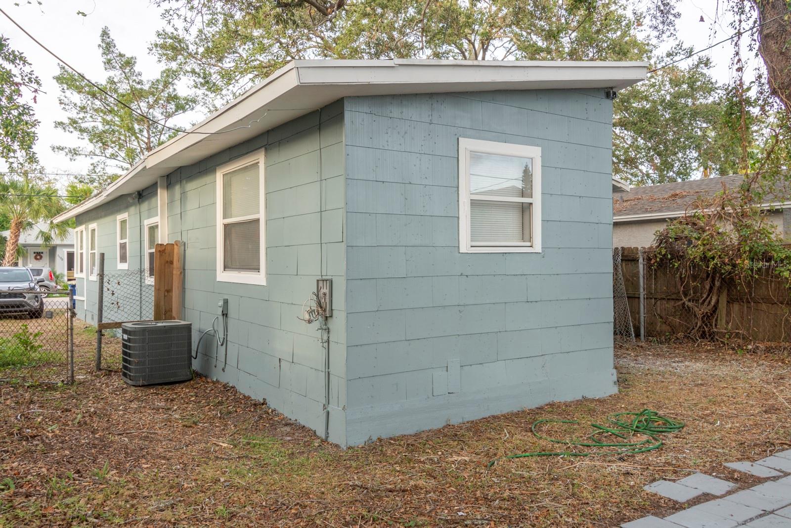 Side yard with deep parking