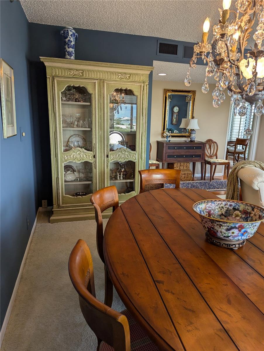 Spacious Dining area looking towards the entry hall. Or, use as a media room or library.