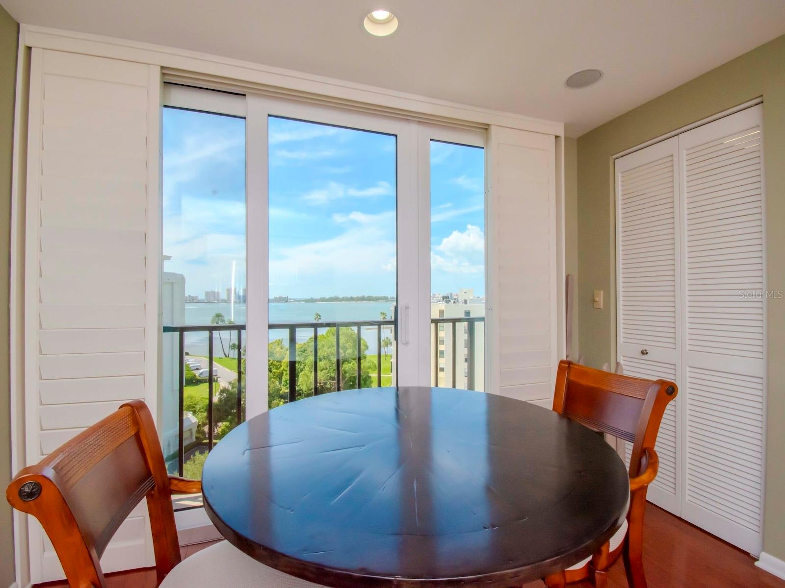 Now this is the best ever! How do you take your coffee? Laundry on the left and pantry on the right of table.