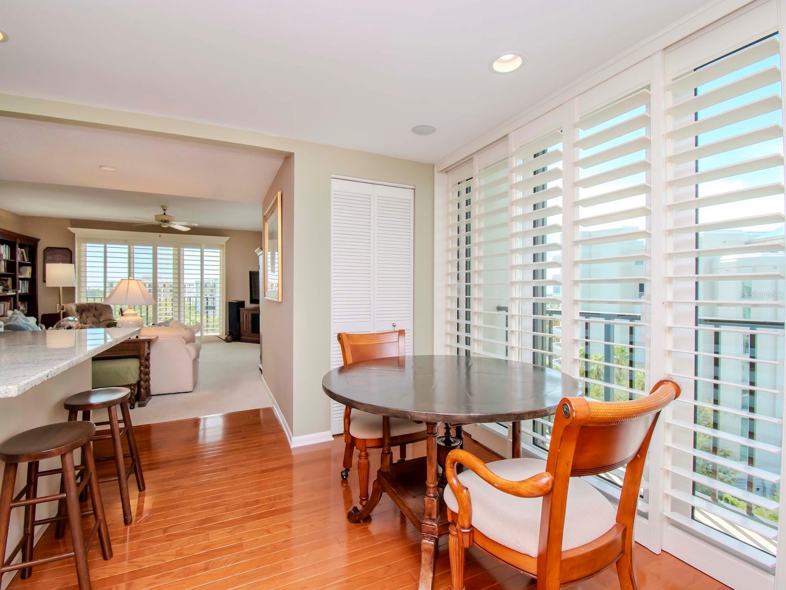 Breakfast table with an incredible view of the water and open to the family room which faces south!