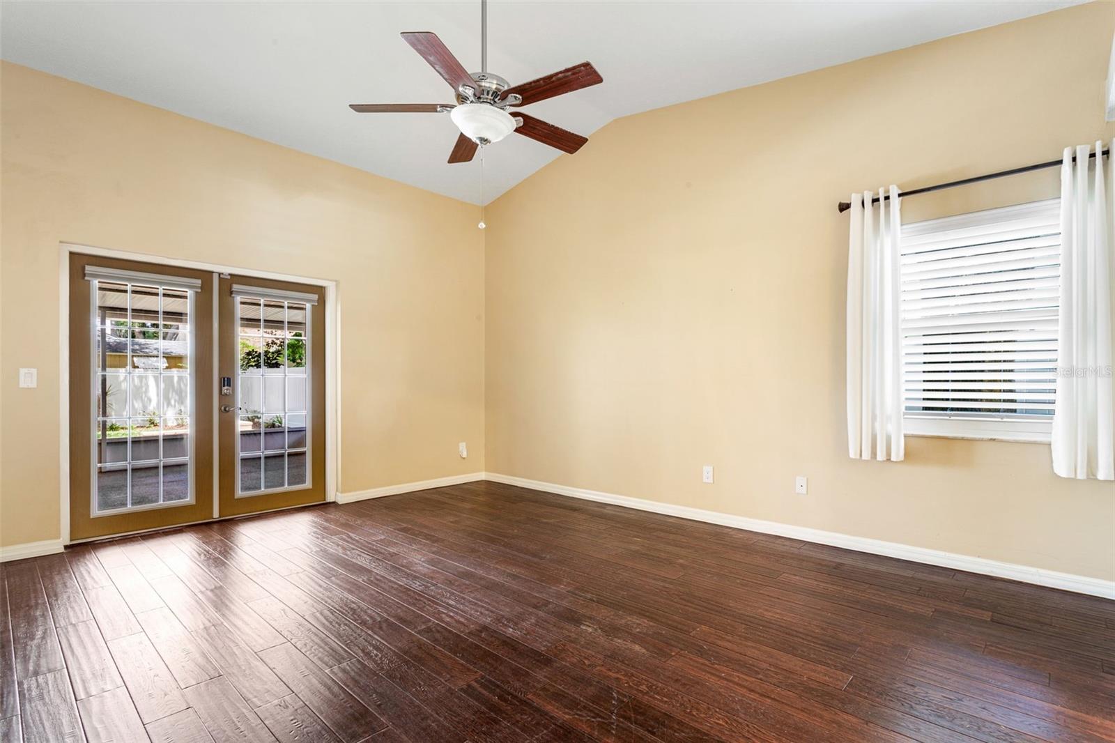 Master Bedroom with french doors to screened lanai