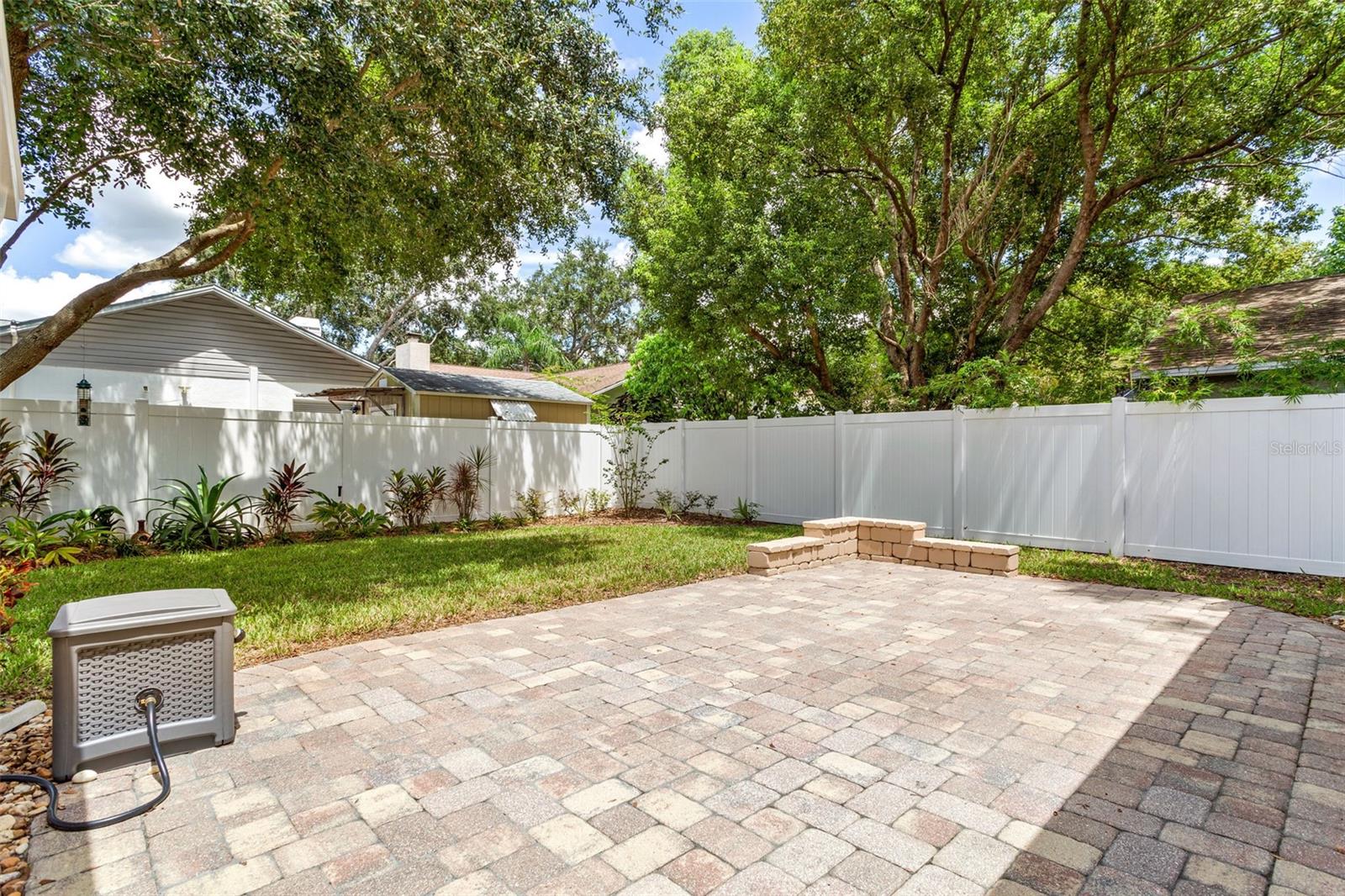 Pavered patio & newer Vinyl Fence