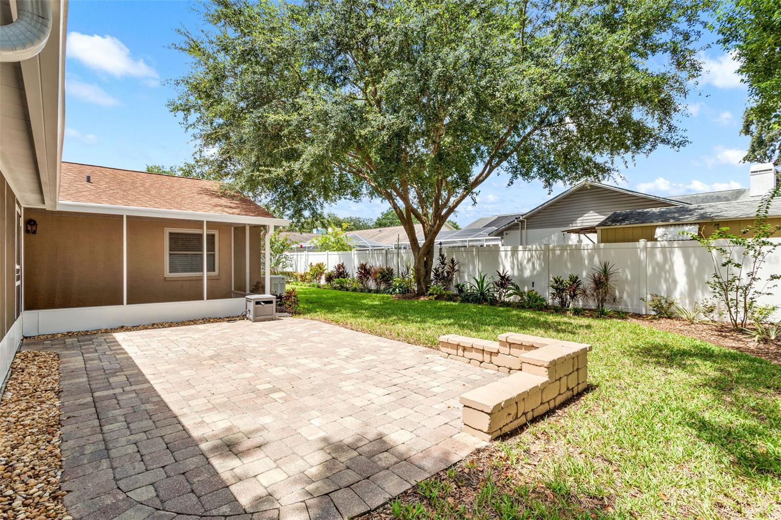 Pavered patio & lovely back yard