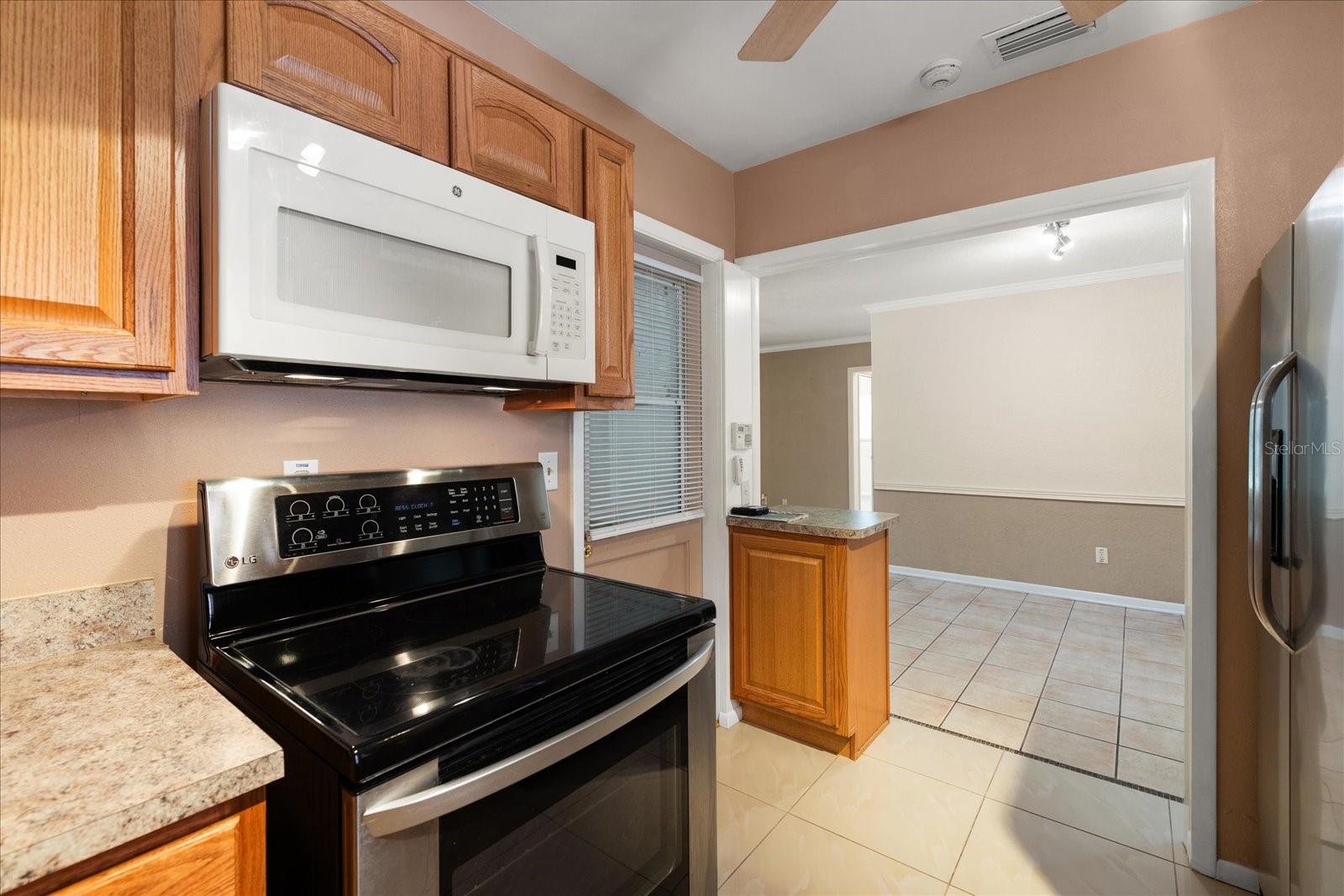 Kitchen with newer appliances.