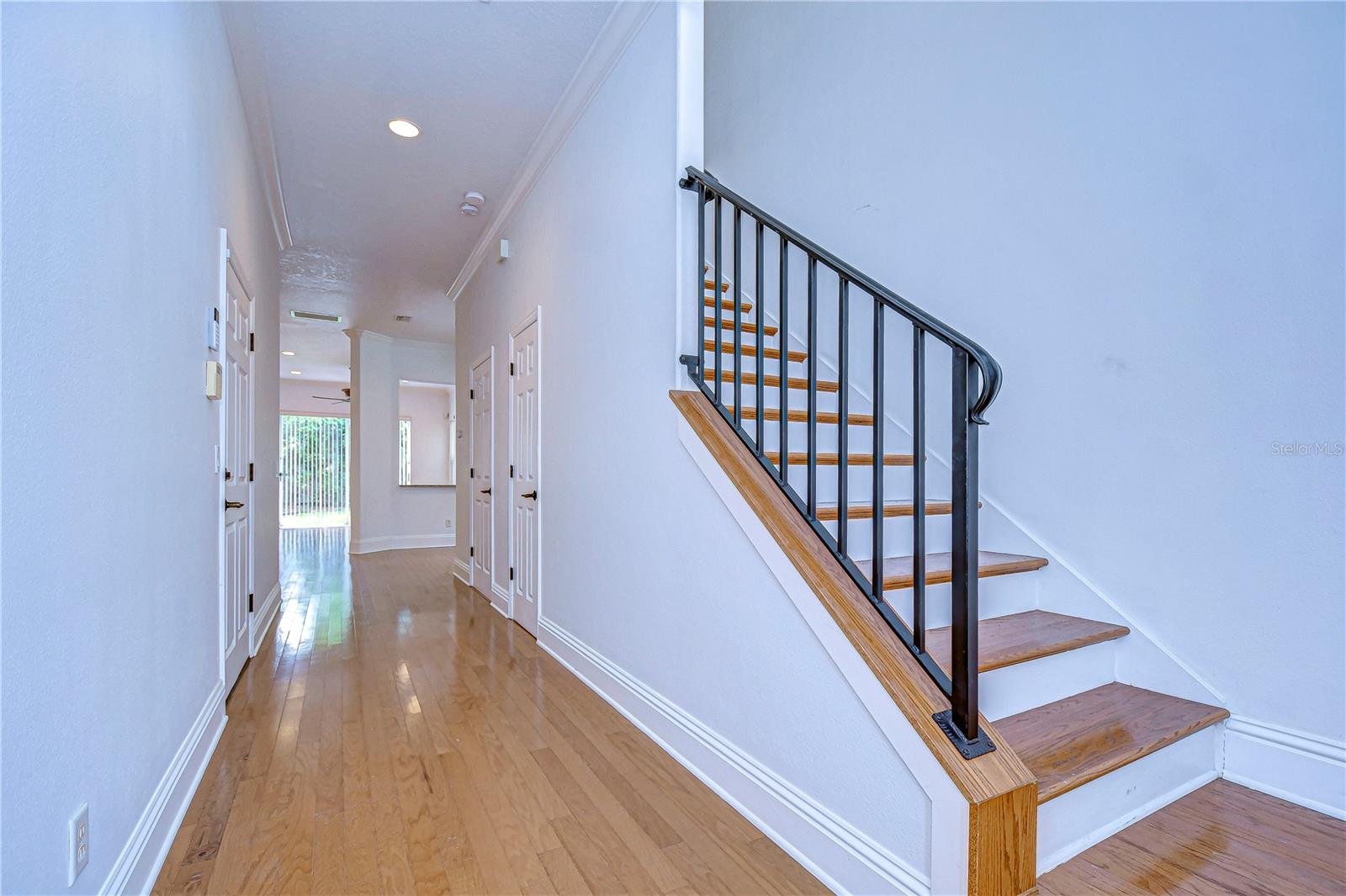 Upgraded stair rail and wood flooring on the stairs and landing bring additional charm and warmth!