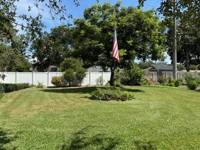 side yard - 1/2 acre double lot