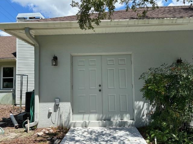 outside double door access to driveway