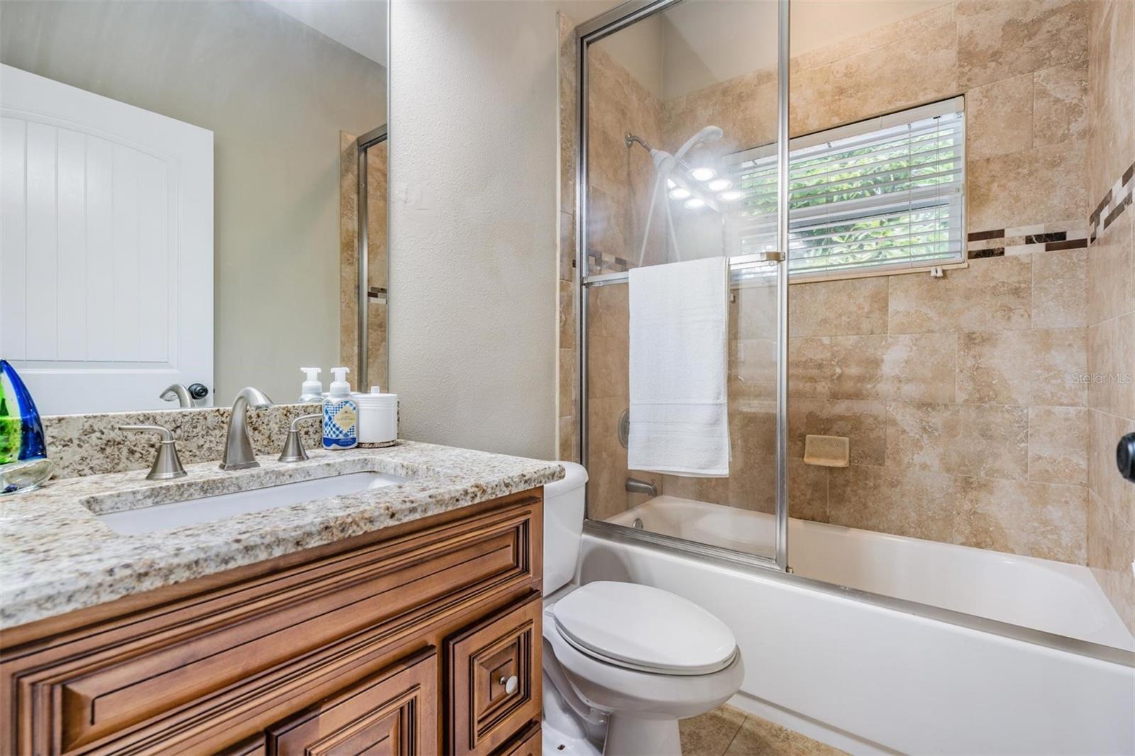 bathroom 2 with tub & dual showerheads