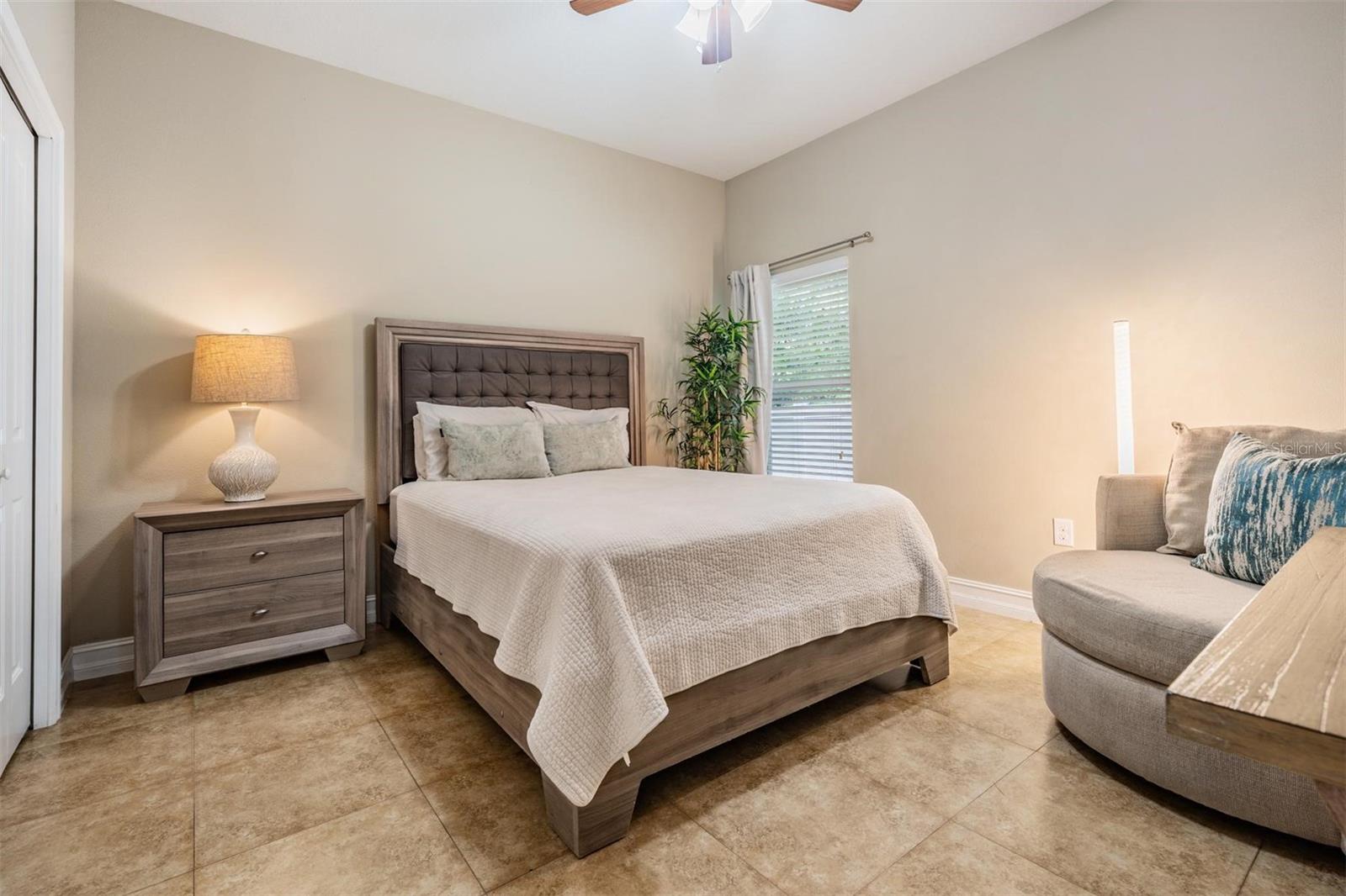 bedroom 2 with custom built-ins closets from wall-to-wall