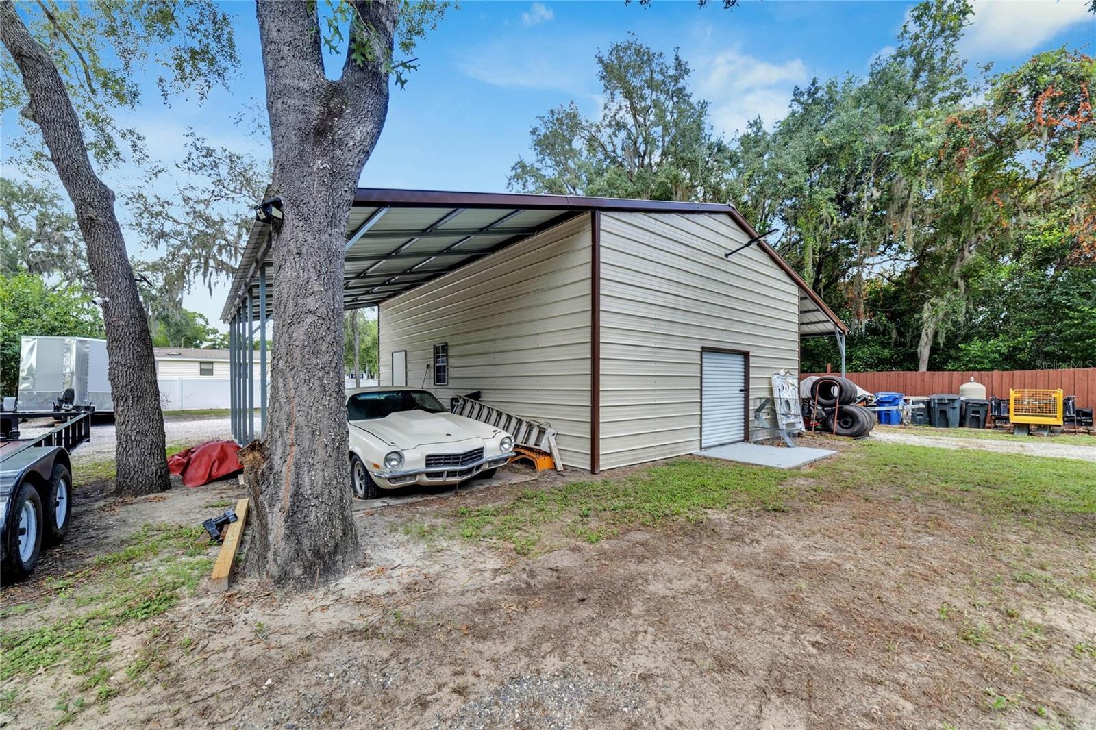 24 ft x 30 ft Detached Garage with TWO 15 ft wide x 30 ft long Lean-to