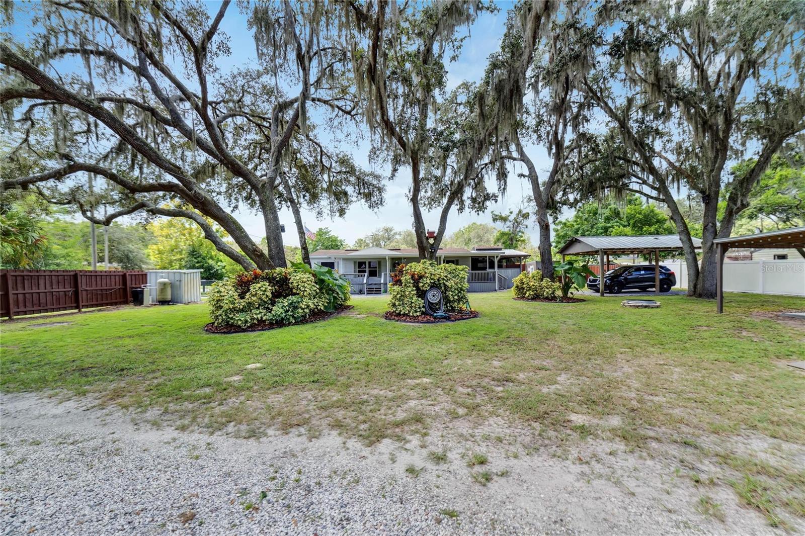 Mature Oaks and lush landscaping