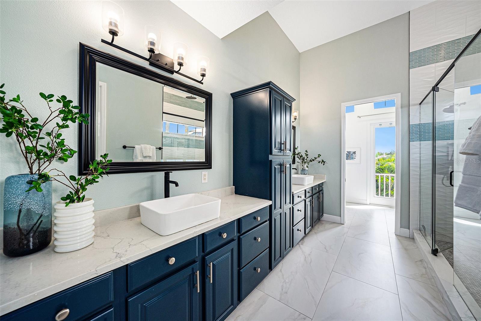 Primary Bathroom with plenty of countertop, storage and double sinks on Calacatta Monaco Quartz