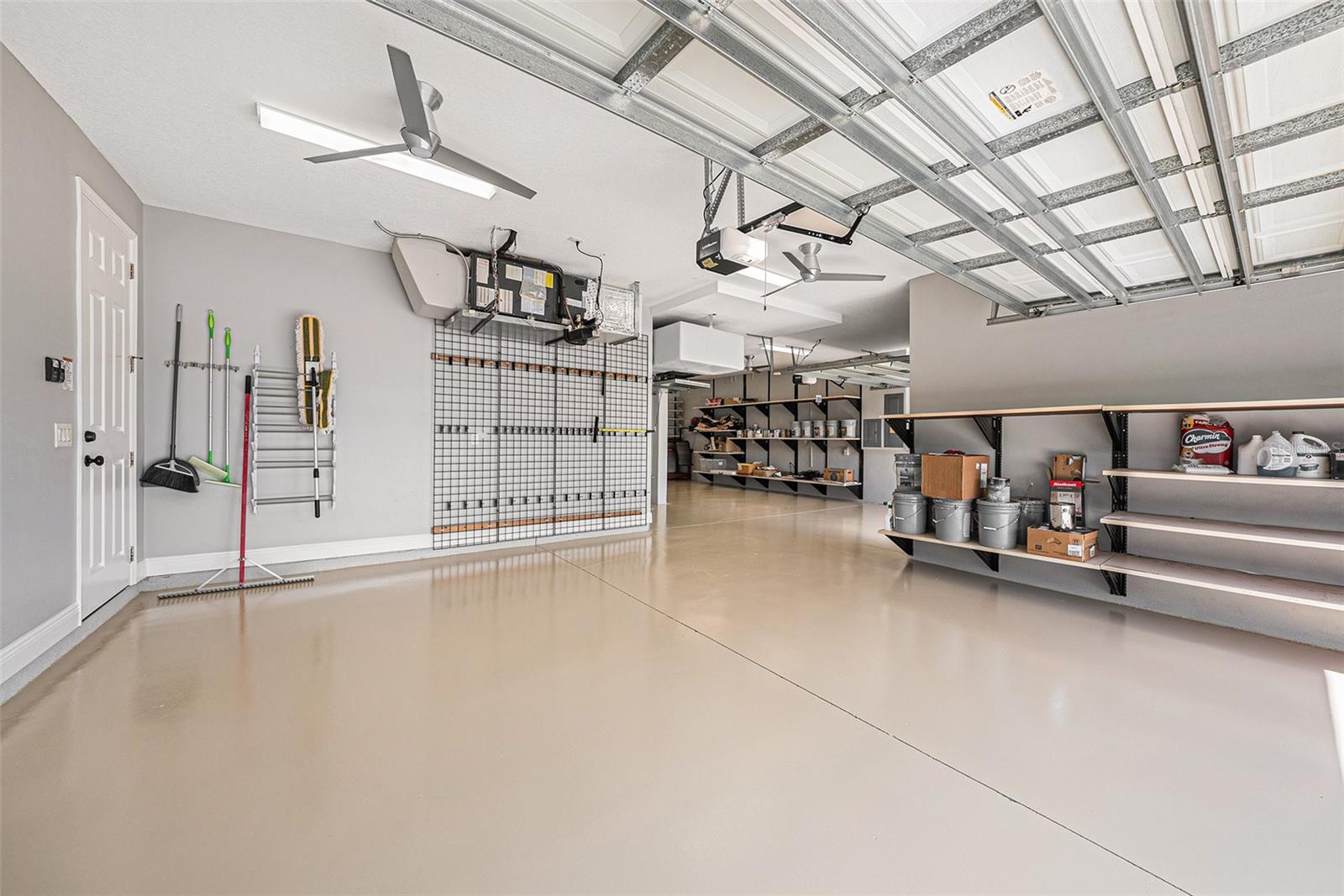 957 sq ft of garage area! Versatile area for vehicles, store a boat trailer or create a workshop