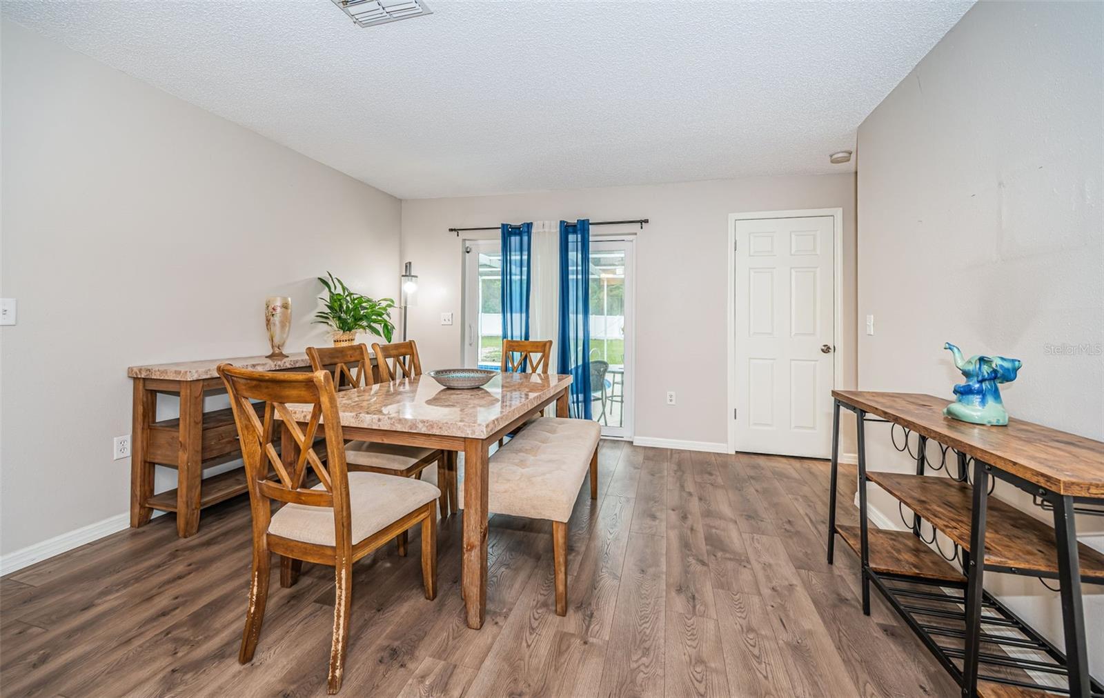 FAMILY ROOM BEING USED AS DINING ROOM