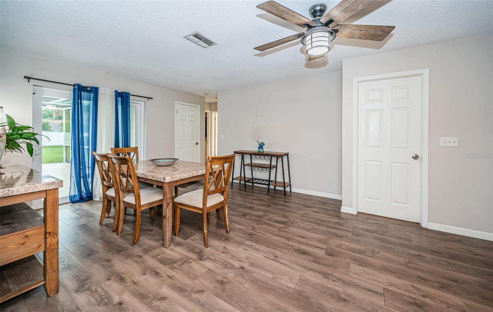 FAMILY ROOM BEING USED AS DINING ROOM