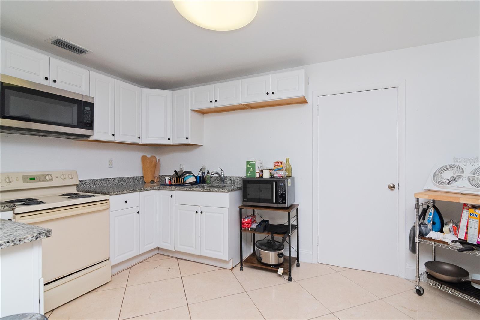 Kitchen offers plenty of counter space and storage