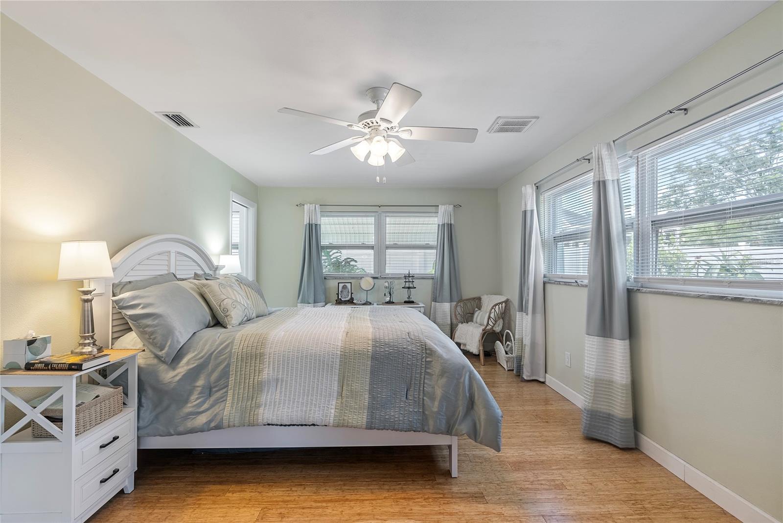 Primary Bedroom.  Door leads to ensuite bathroom featuring a walk-in shower