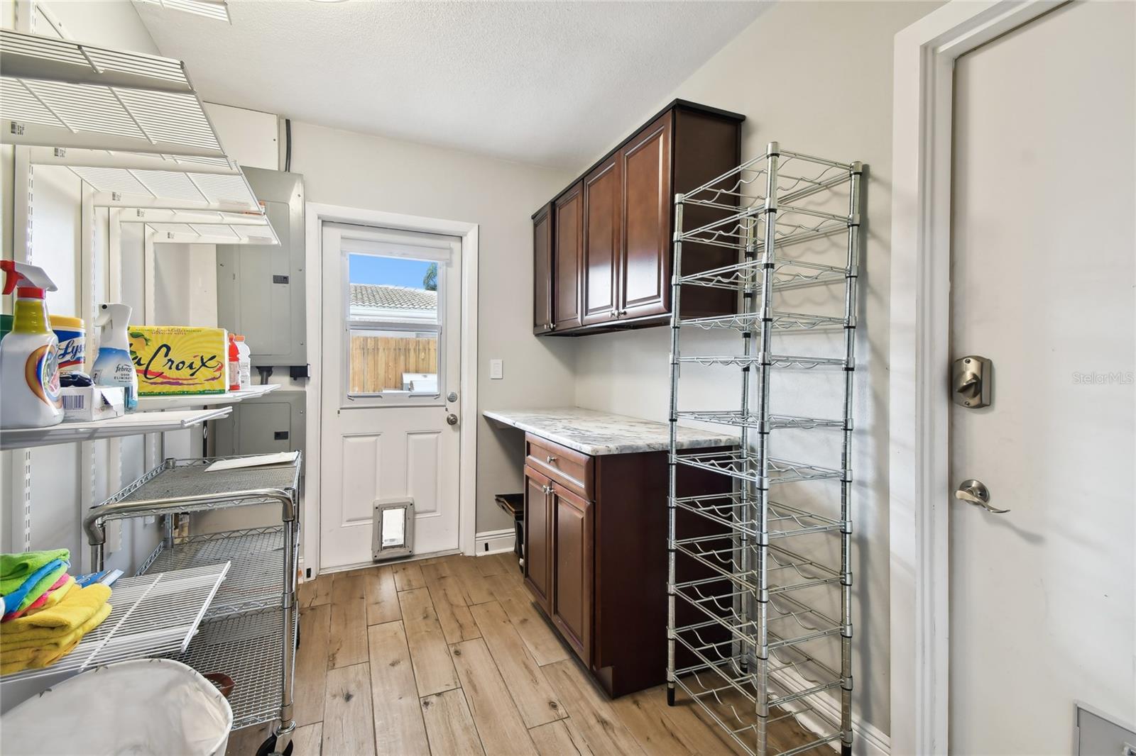 Laundry room/utility room, exit to patio/spa