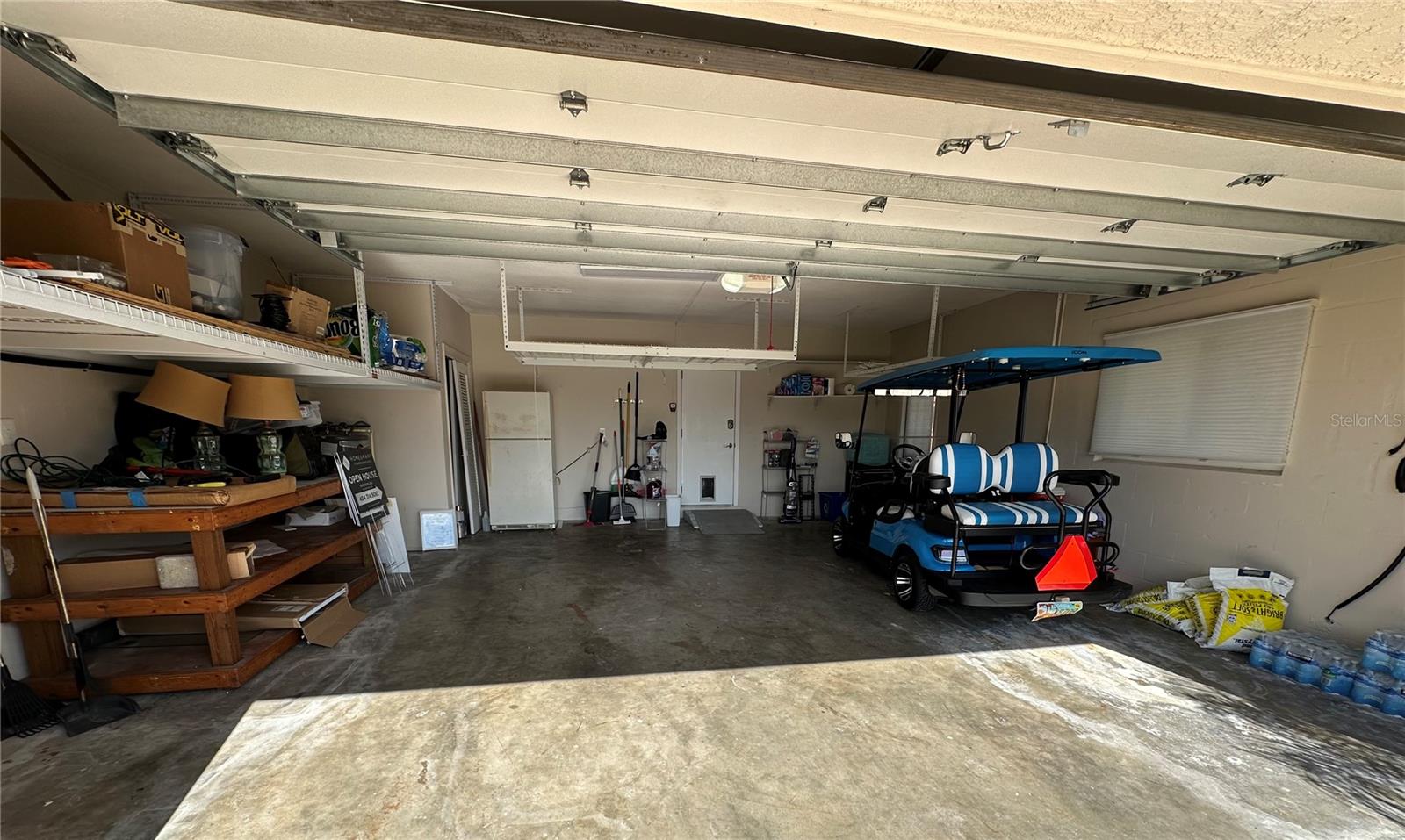 Huge double car garage with workbench.