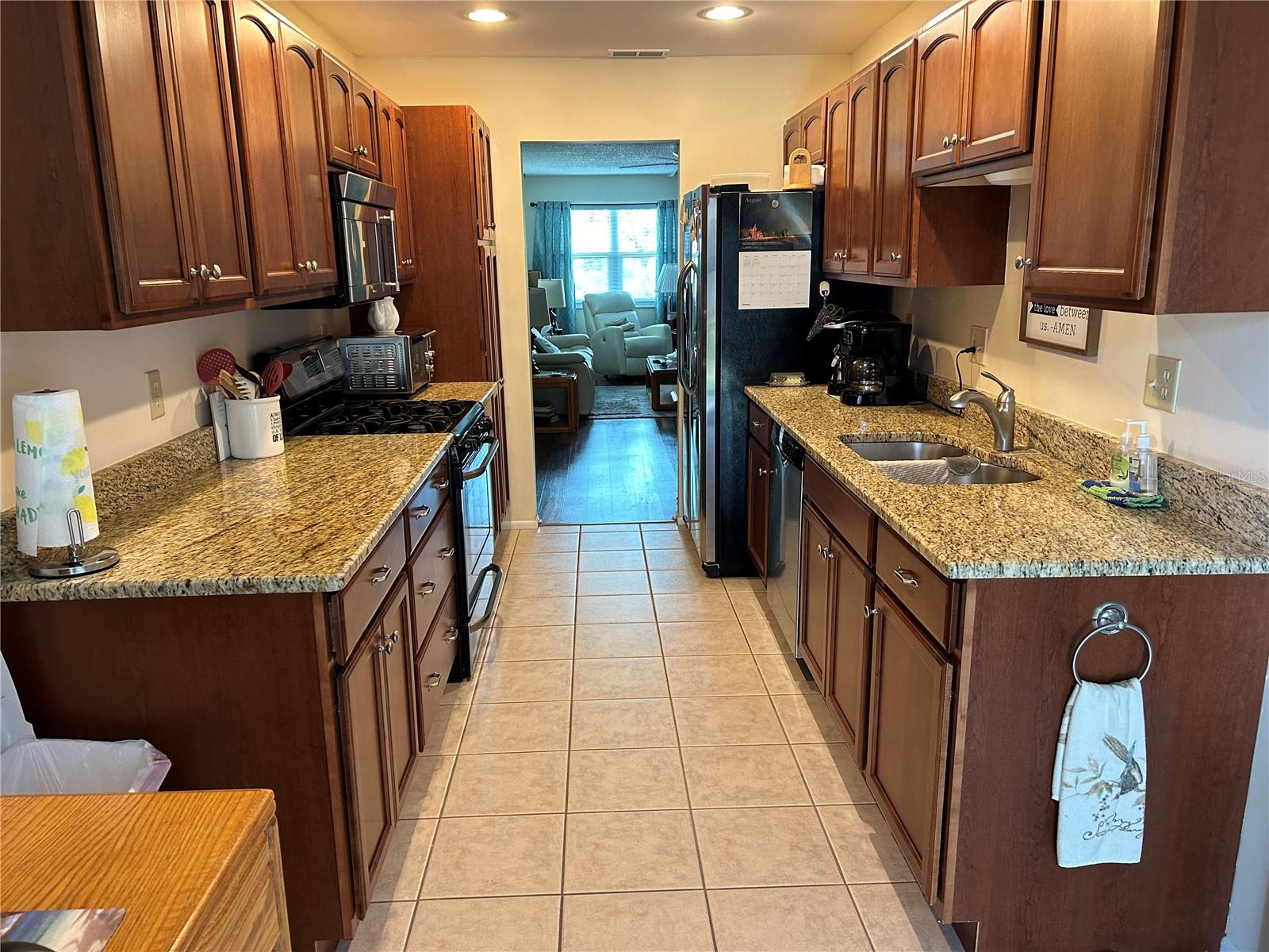 KITCHEN VIEW TO LIVING ROOM