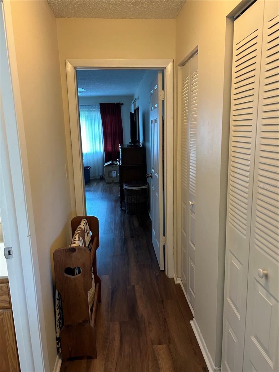 HALLWAY FROM LIVING ROOM TO MASTER BEDROOM