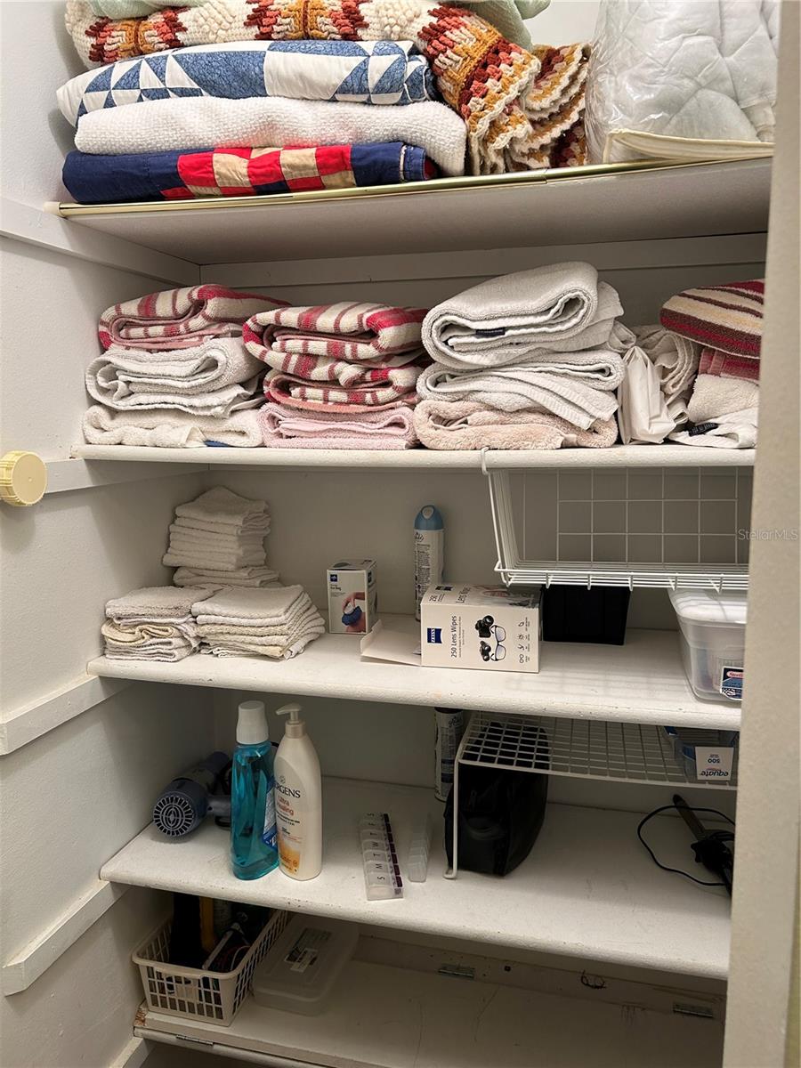 LINEN CLOSET IN HALLWAY