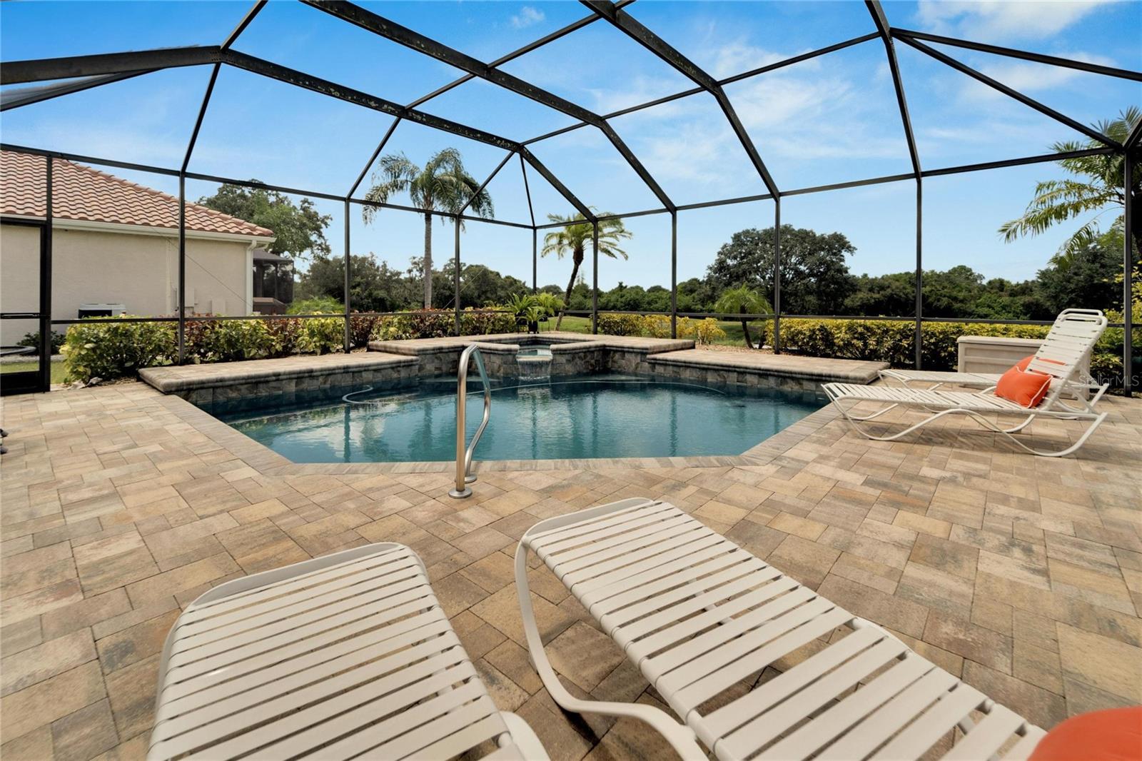 Rear Screened Paved Lanai & Pool