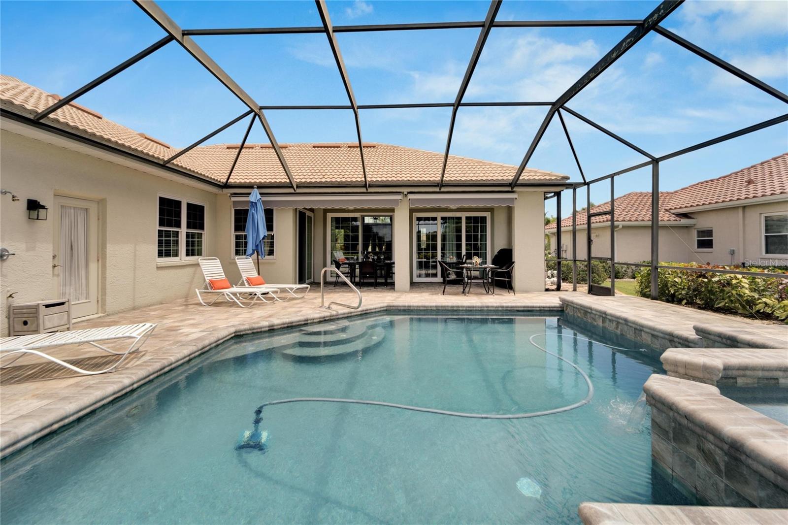 Rear Screened Paved Lanai & Pool