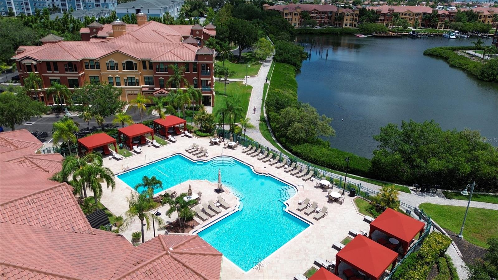 Waterfront Pool with Cabanas