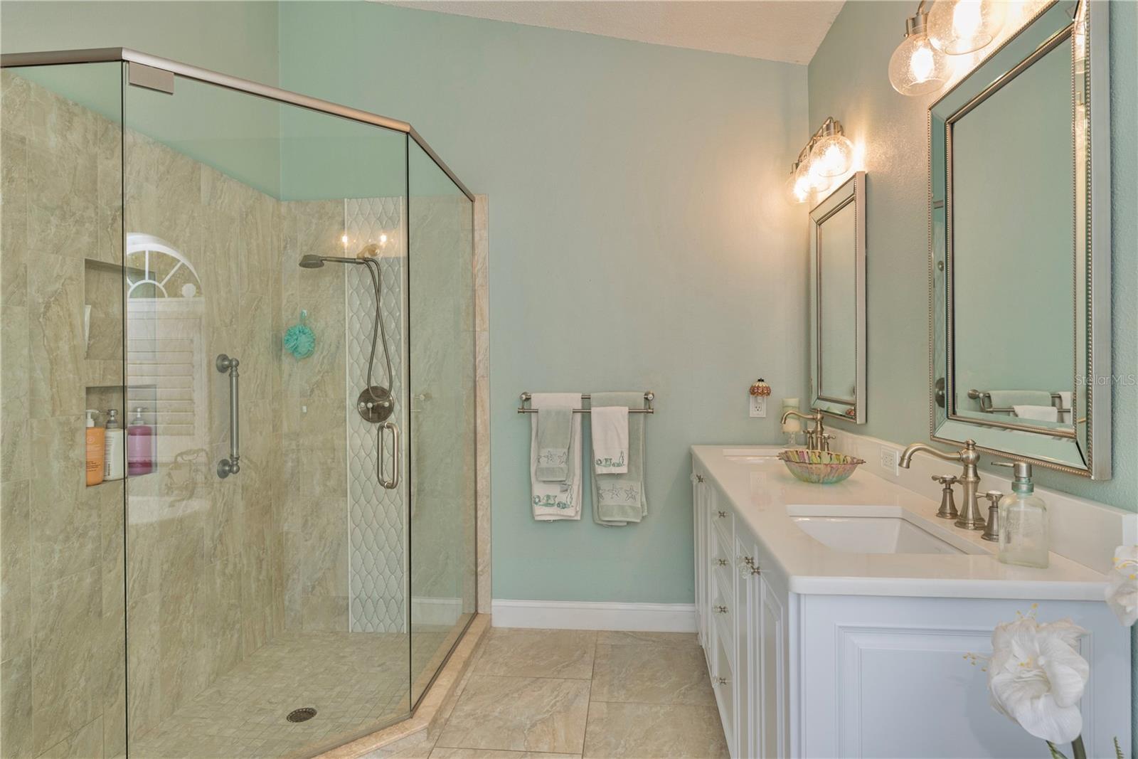 Glass shower surround.