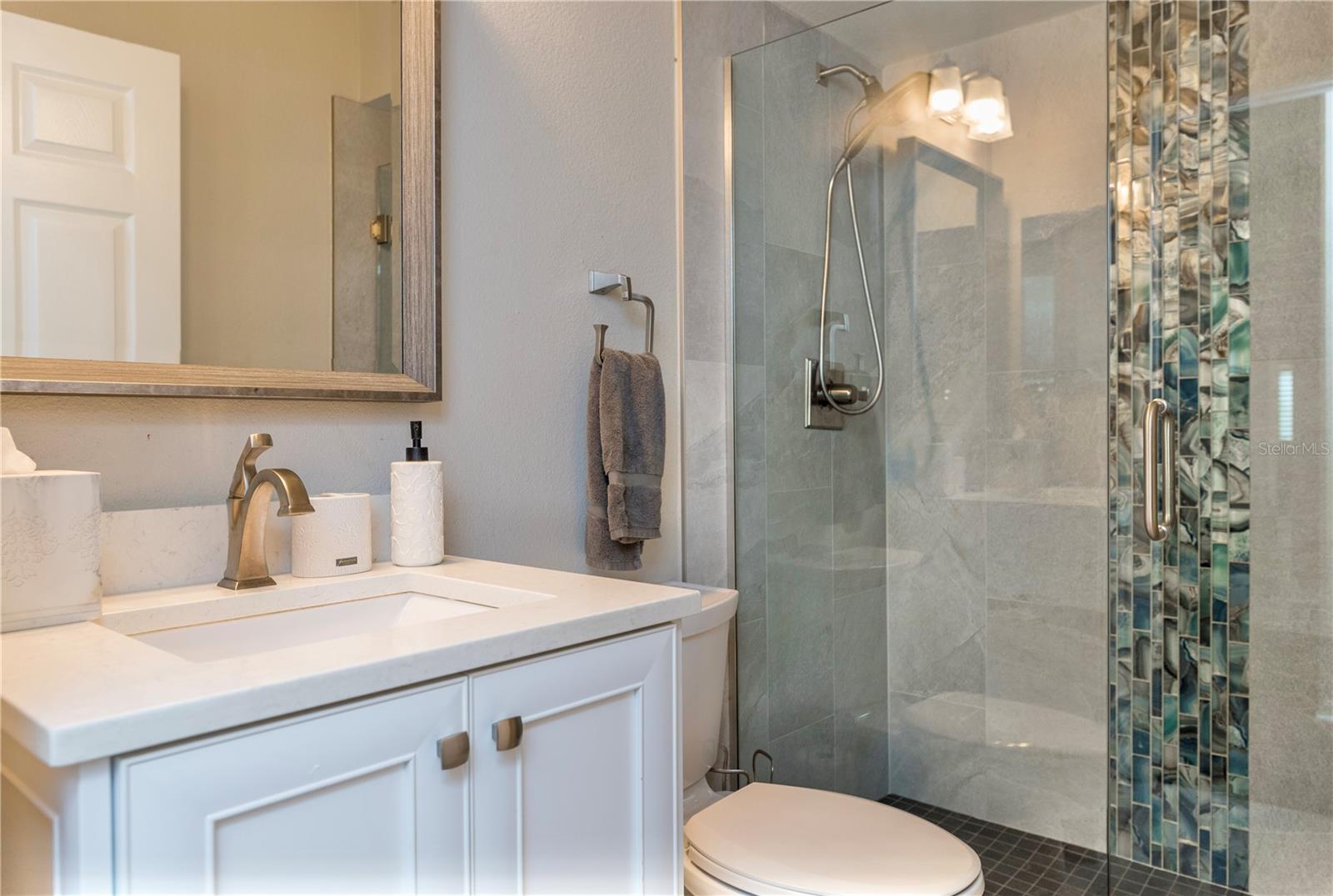 Updated guest bathroom with shower.