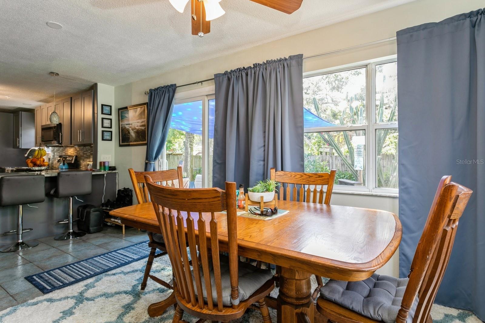 Dining area unites the kitchen with the family room