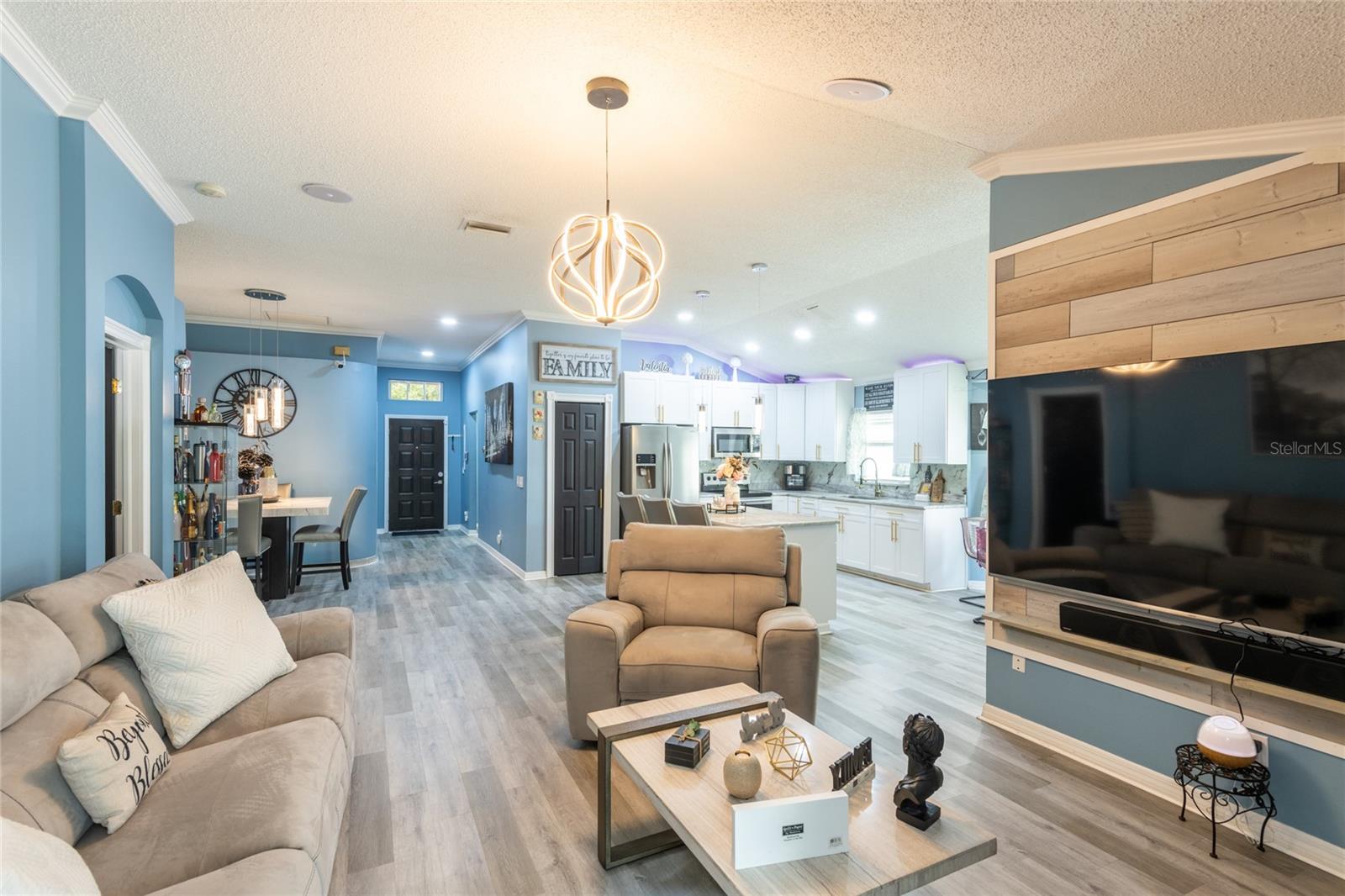 Color lights over kitchen cabinets.