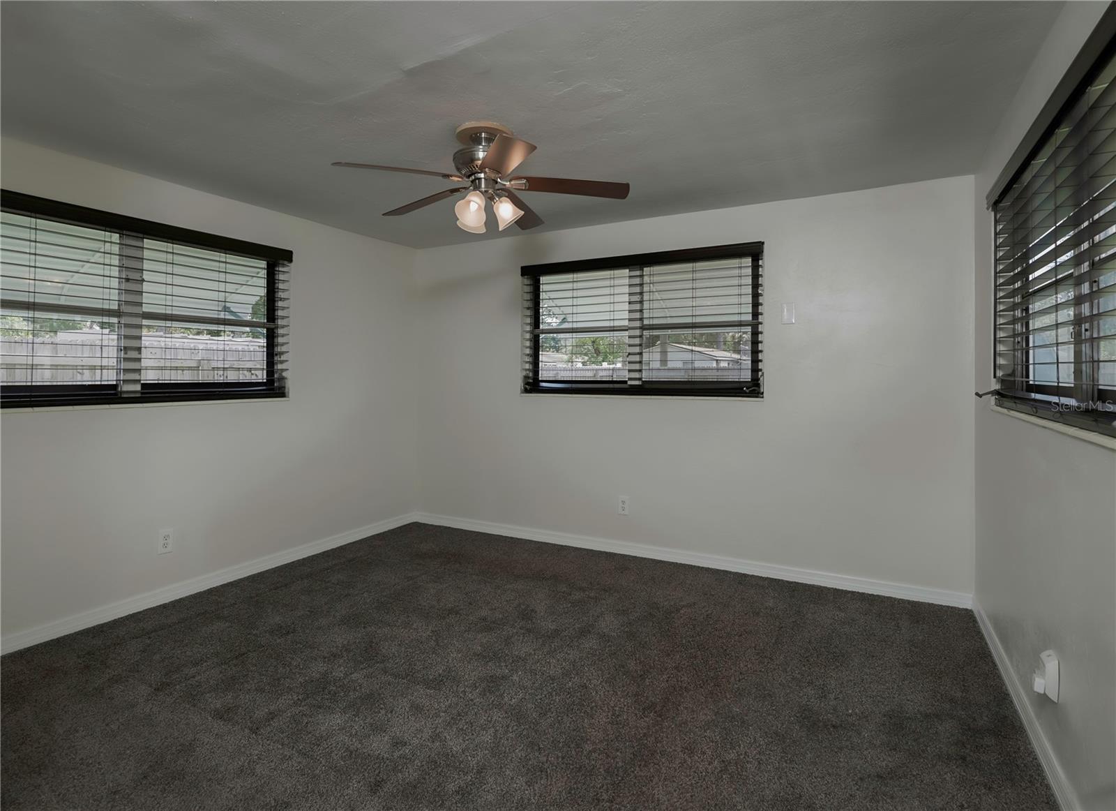 Rear bedroom with private backyard access