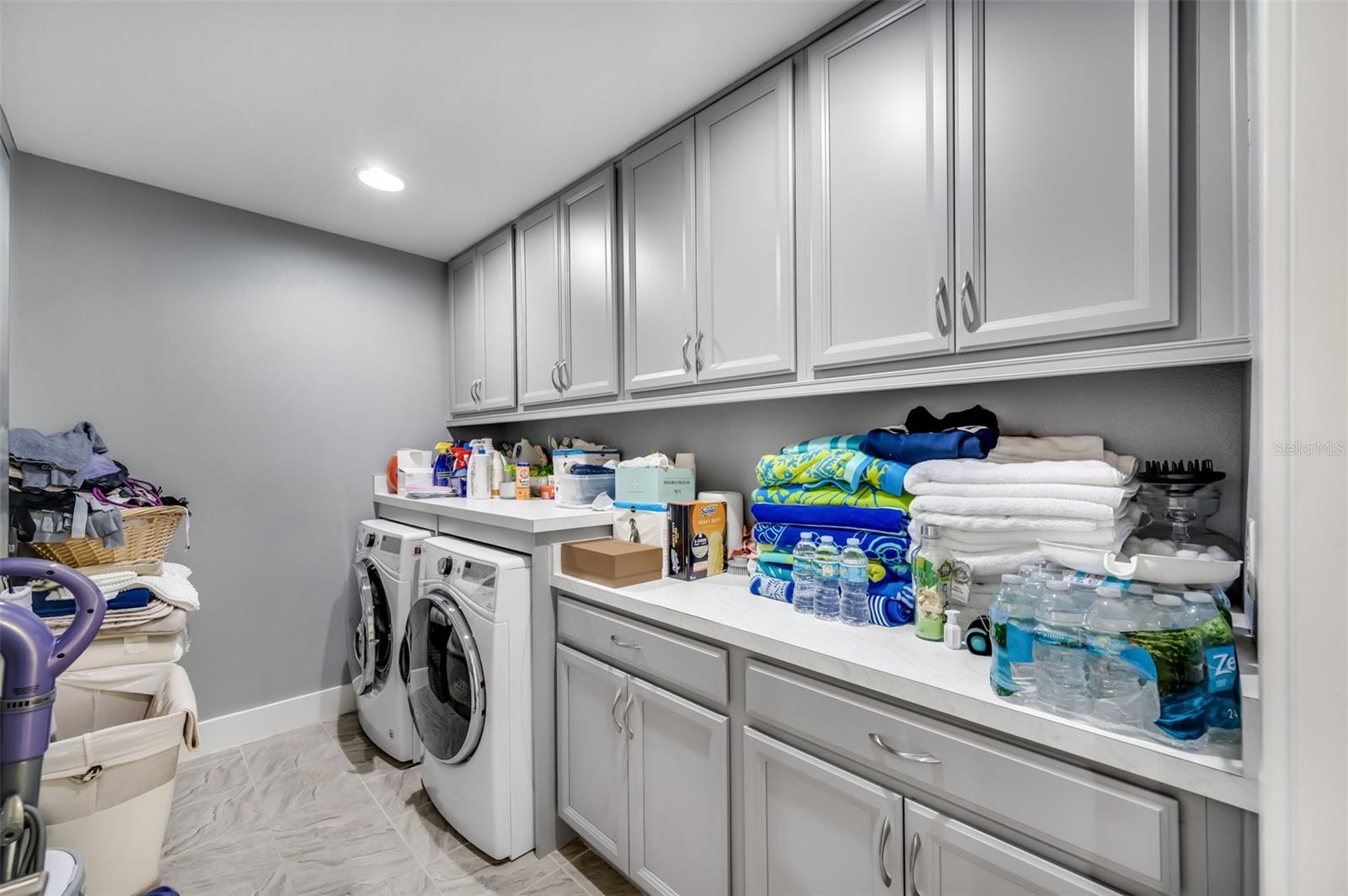 Laundry room with cabinets