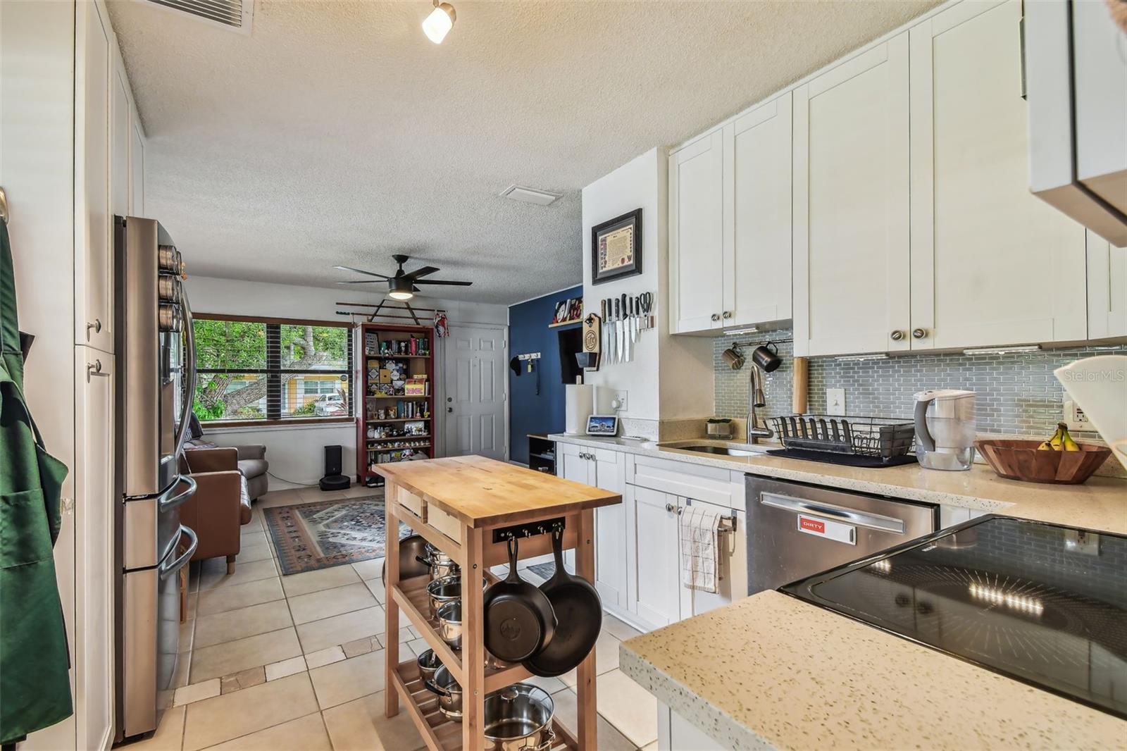 Kitchen with view into living room