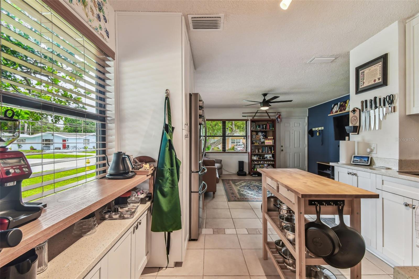 Kitchen with view into living room