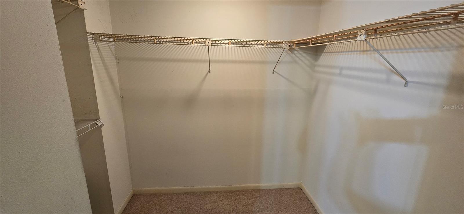 PRIMARY BEDROOM, Walk in Closet - 6 'x 7'.6"