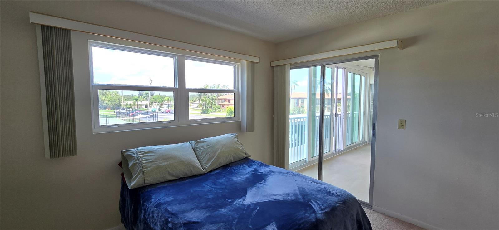 Primary Bedroom. Sliders to Patio.