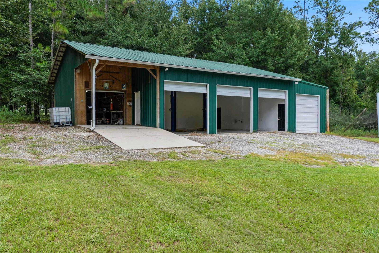 5 bay metal garage with concrete floor