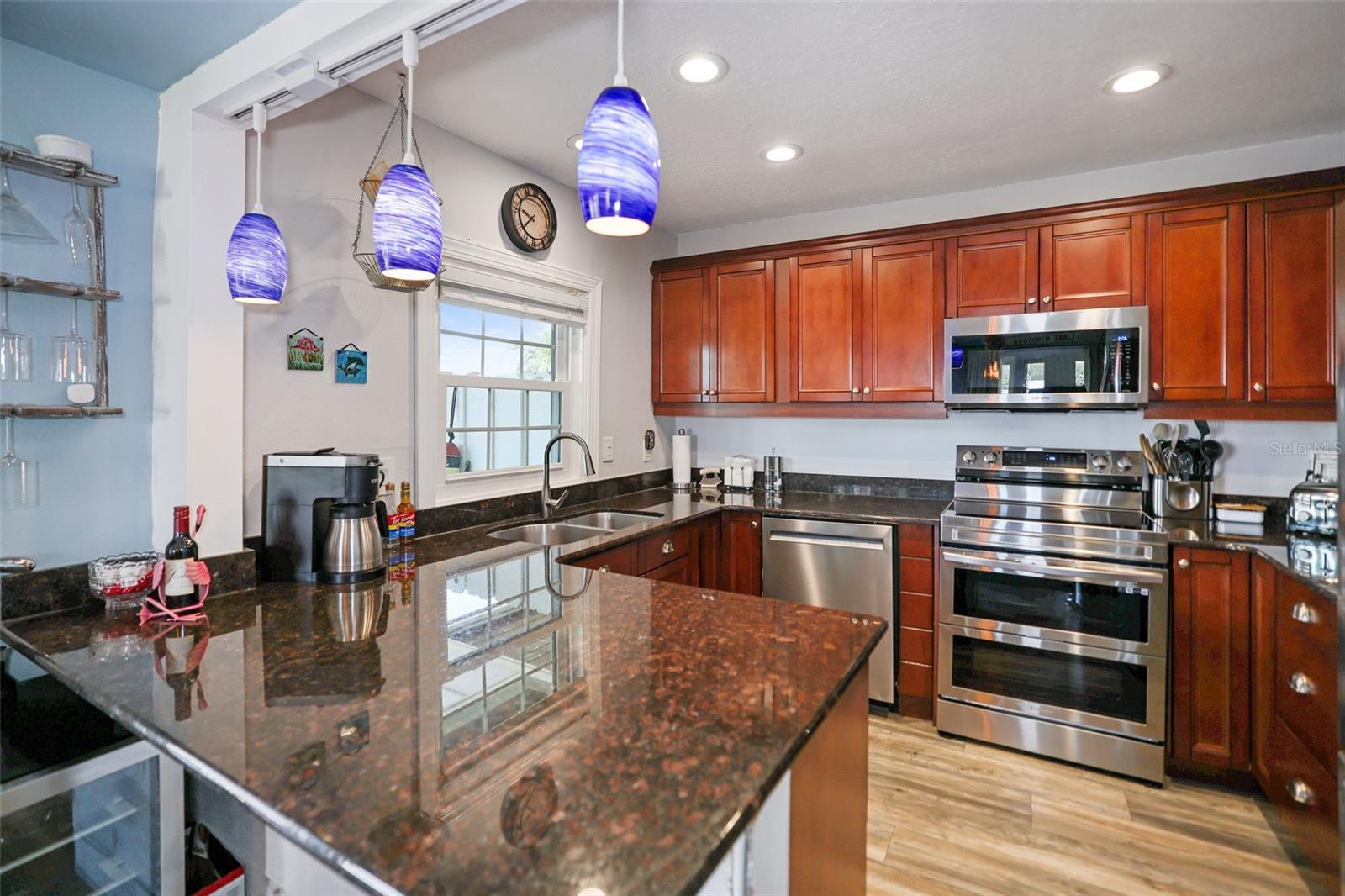 Kitchen with Granite countertops and Stainless Steel Appliances