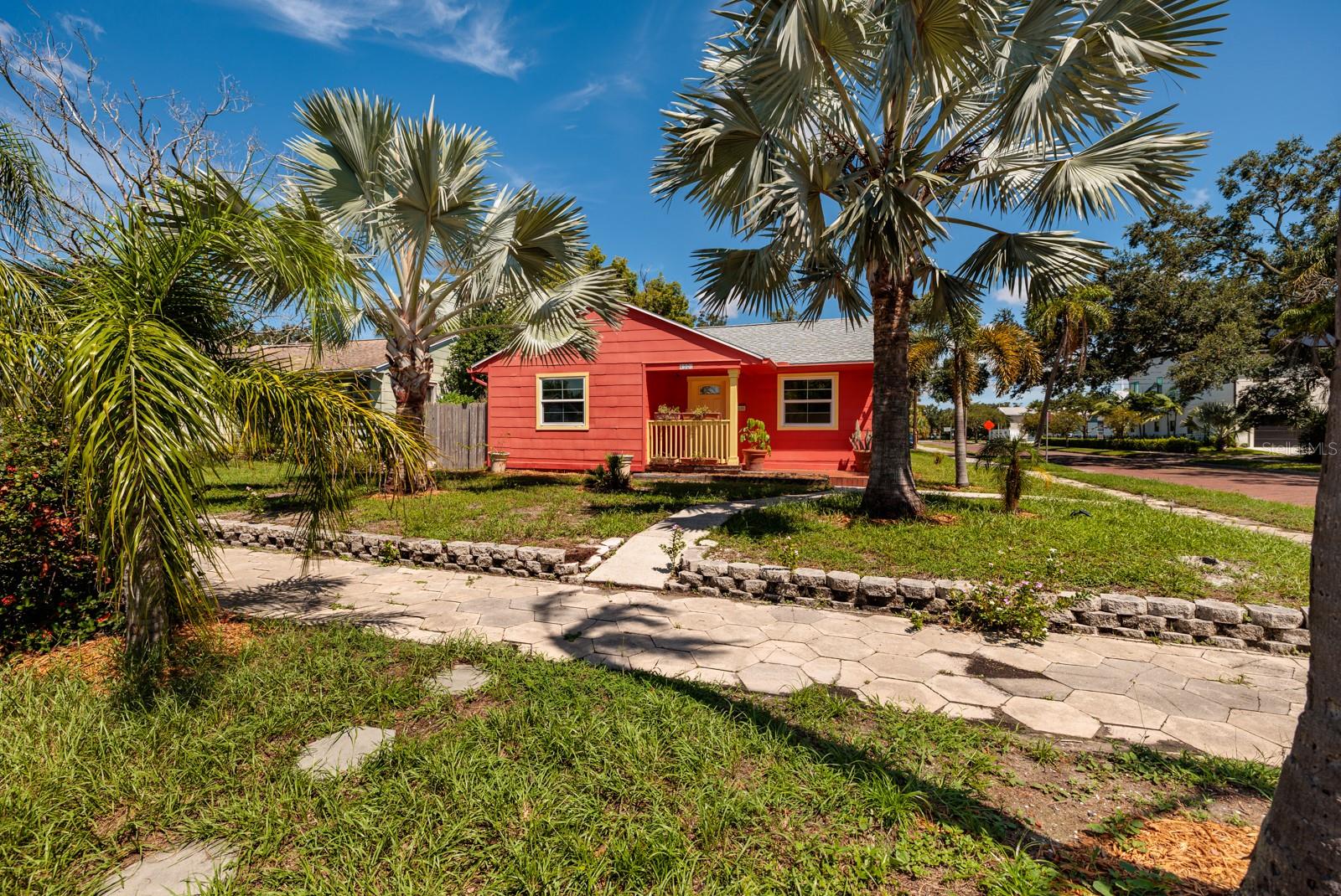 Corner lot. Bismark palm trees. New roof Aug 2024. Non-Flood zone.