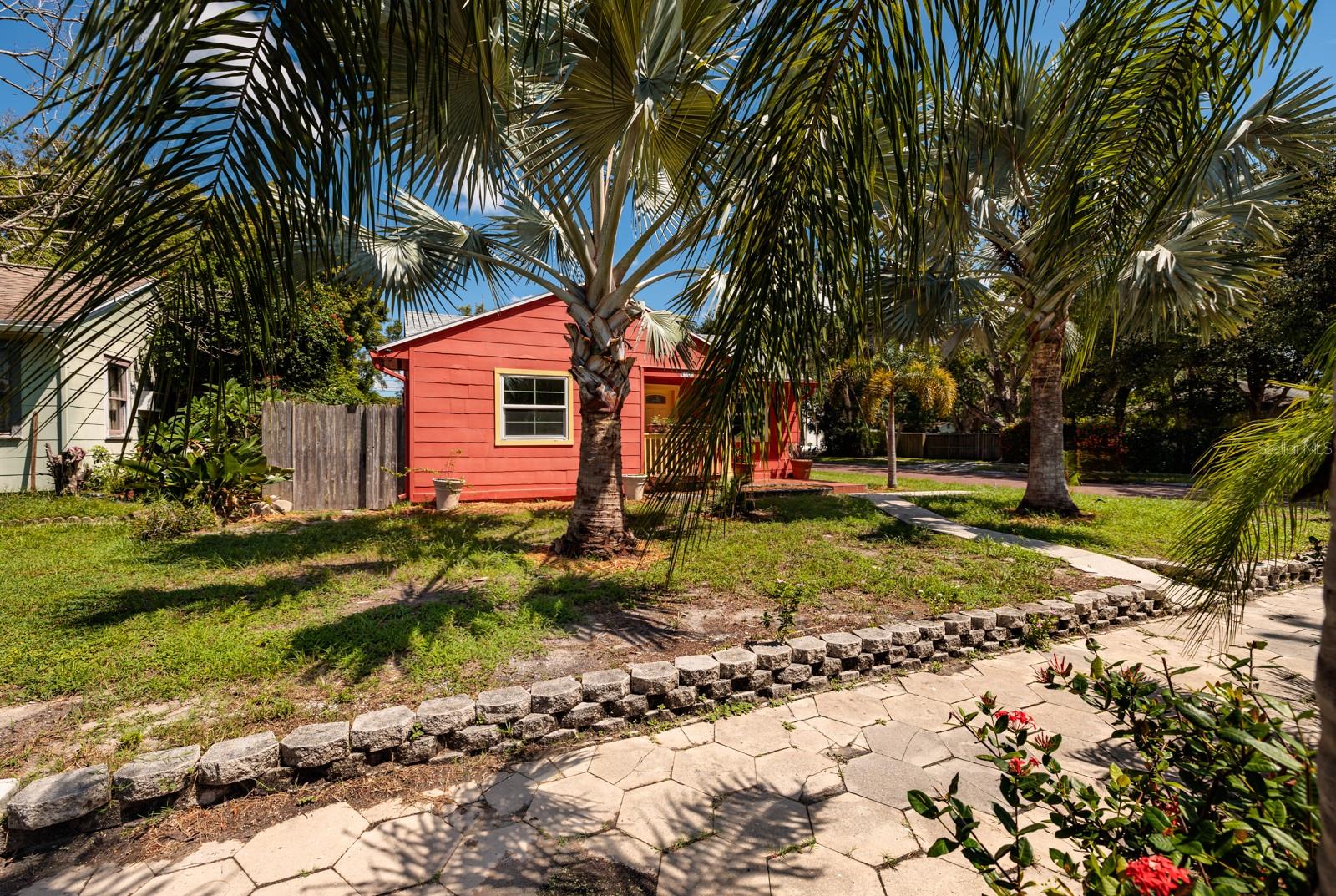 Non-Flood zone. Paver sidewalk & tropical yard.