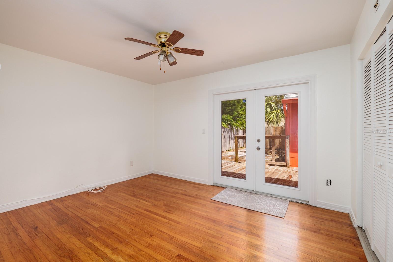 2nd bedroom w/French doors to back porch.