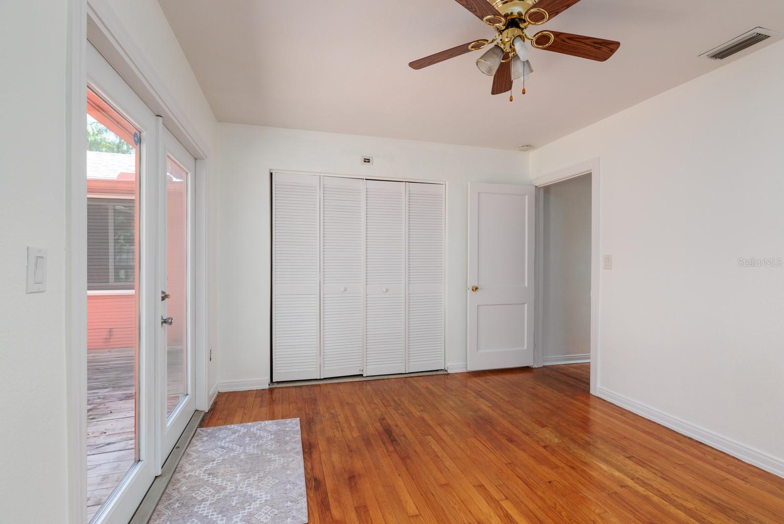 2nd bedroom w/built in closet. Wood flooring.