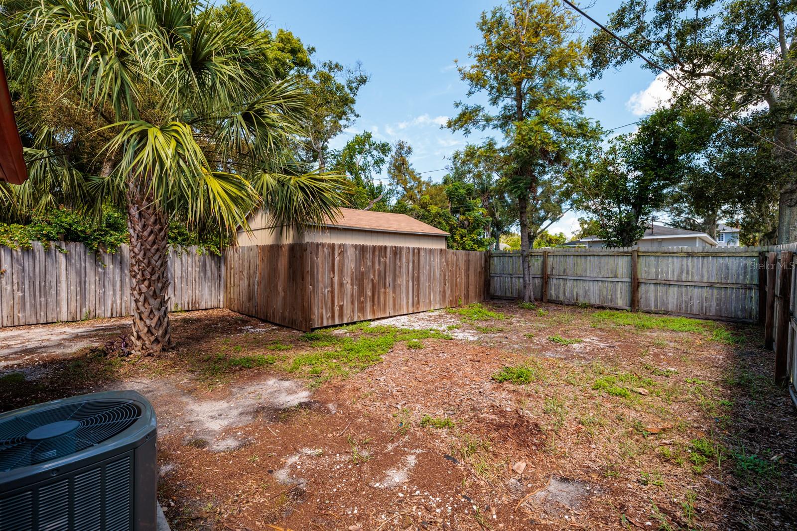 Backyard & shed on alley.