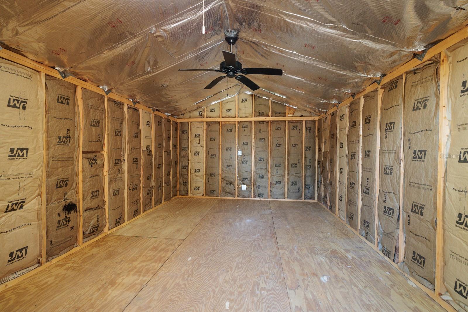 Large insulated shed w/electric.