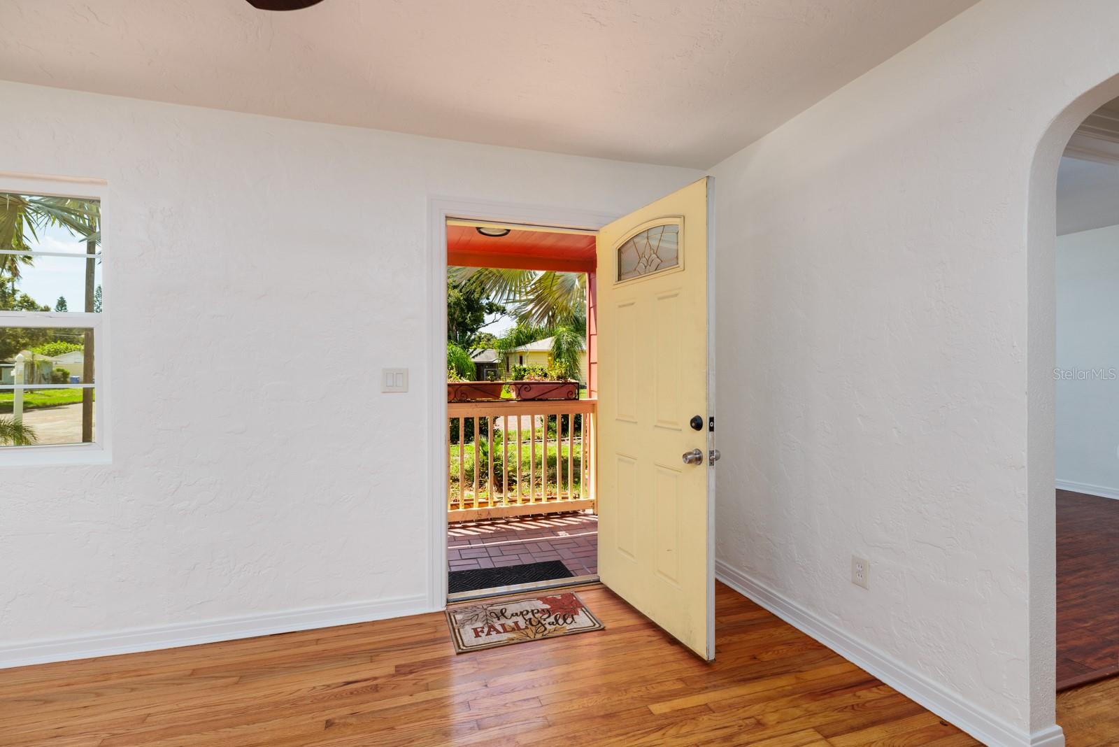 Front door to covered porch.