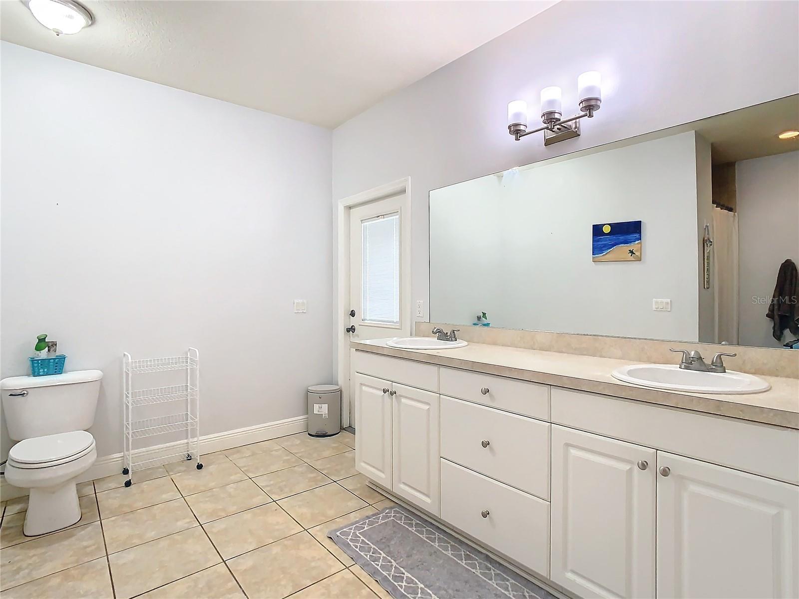 Modern Main Suite Bathroom with double sinks