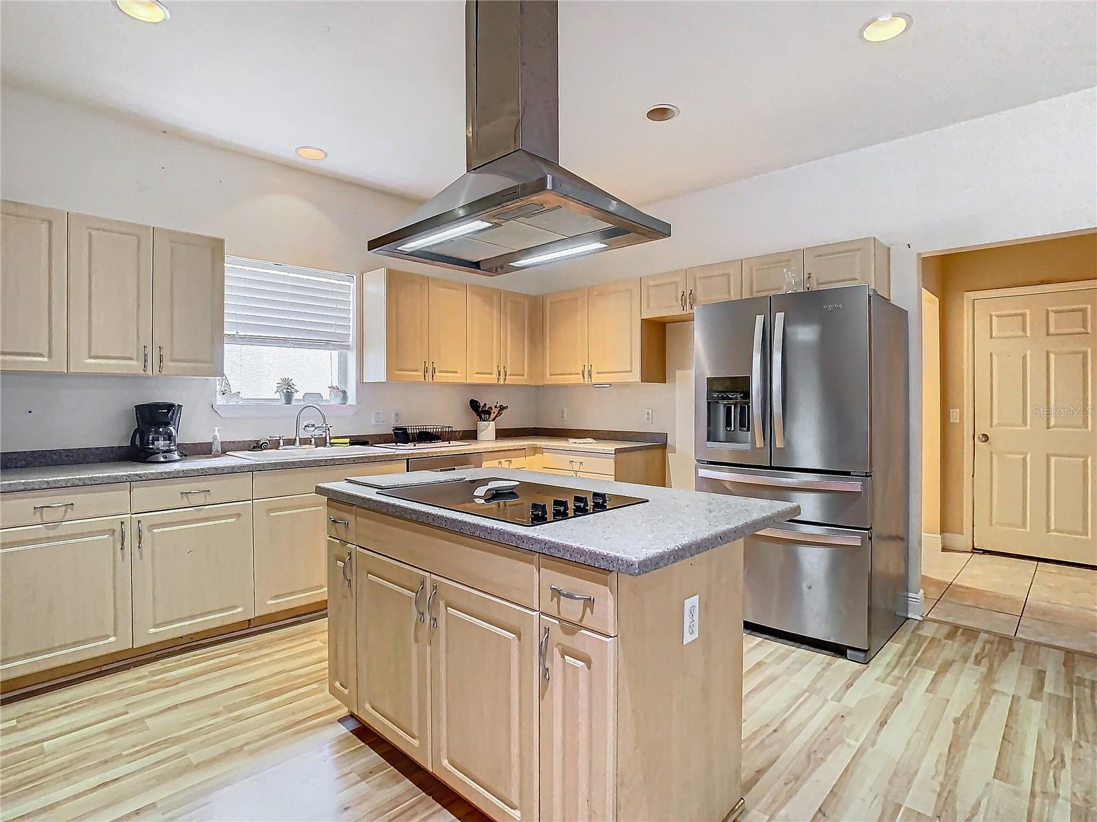 Large French Door Refrigerator and Cooking Hood